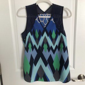 Made in USA. Perfect sleeveless Renee C. top.  Dress up or down.